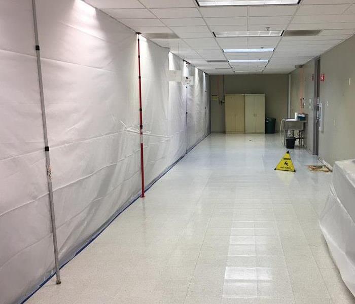 Containment wall setup to prevent medical equipment from contamination