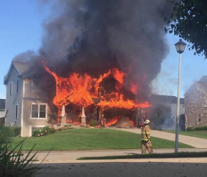 House engulfed in flames due to an electrical fire