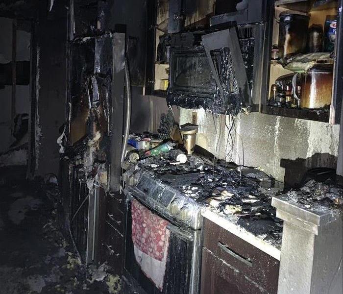 Picture of a kitchen burnt due to a fire