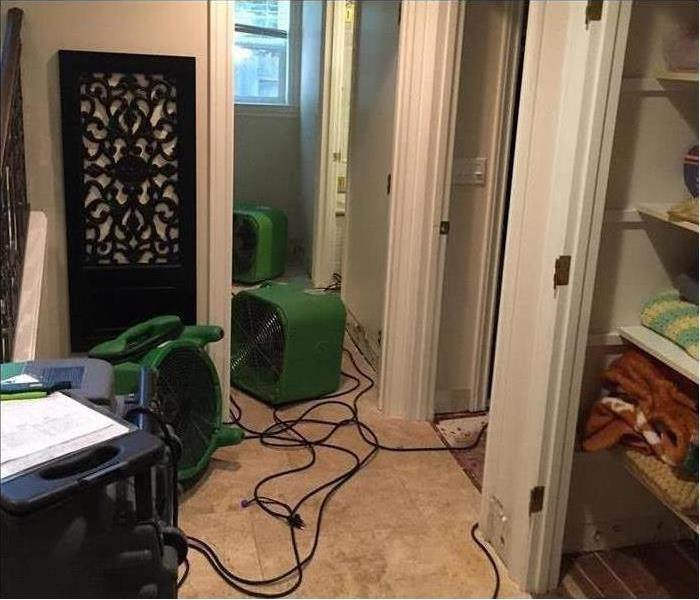 SERVPRO drying equipment in a residential room